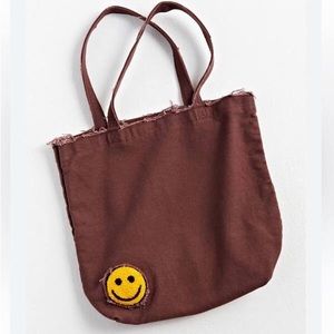 ❄️4 For $20 UO Smile Patch Distressed Canvas Tote Bag